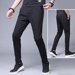 Load image into Gallery viewer, 2024 new Men&#39;s Ice Silk Trousers Solid Color Mid-Waist Loose Breathable Straight-Leg Casual Pants Thin Quick-Drying Sports Pants  Amaijoin
